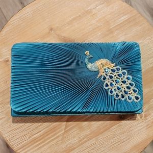 Teal jeweled peacock clutch